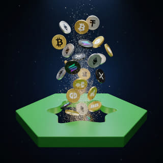 反射する暗い表面の上に並べられた様々な暗号通貨コイン